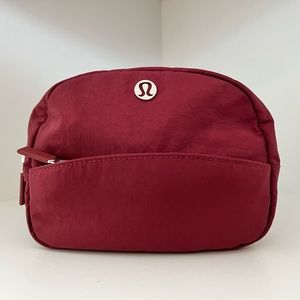 Lululemon cosmetic bag in wine berry